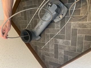 トイレ脱着後のソケットから高圧洗浄